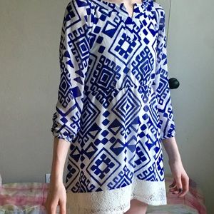 Blue patterned dress with cream crochet trim